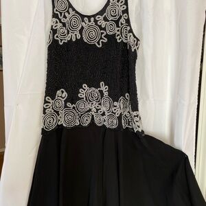 Black Beaded Sleeveless Evening Dress with White Swirl Embellishment